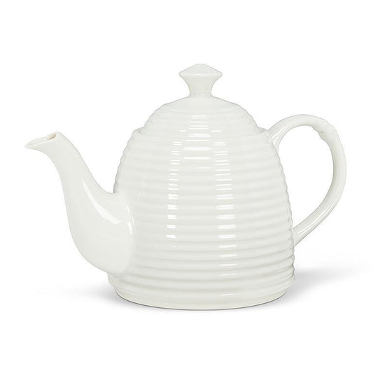 beehive shape teapot  cup of tea