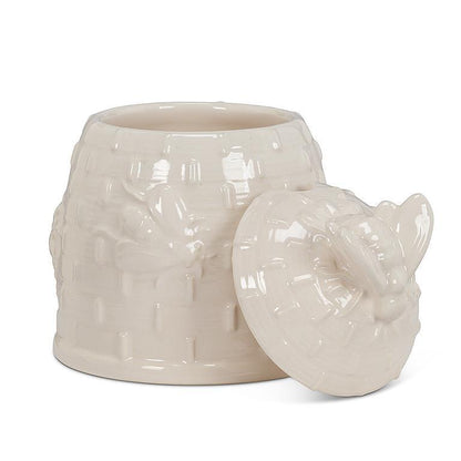 white bee hive honey pot with spoon